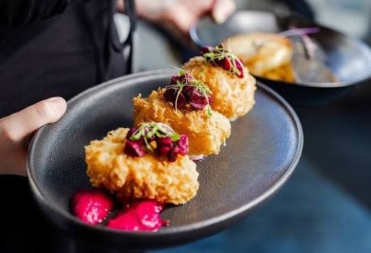 Mariposa signature dishes Moroccan Mezze Board
The Asado Experience
Bakaliaros Skordalia